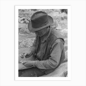 Gold Prospector Putting Flakes Of Gold Which He Has Recovered Through Wet Washing And Panning Into Bottle Art Print