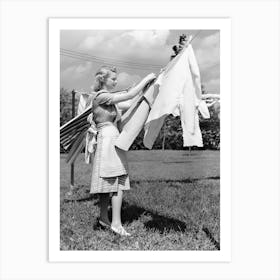 Lady Hanging Laundry on Clothesline, Vintage Black and White Old Photo Art Print