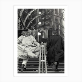 Couple Running Up Steps In Big Coats Black And White Art Print