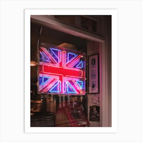 London, England I Neon light of the United Kingdom flag in a moody dark window on a Londoner street to the vibrant cosmopolitan spirit of the English capital with abstract analog film photography Art Print