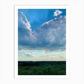 Cumulus Clouds Dominating A Spring Landscape Sunlight Peeks Through The Overcast Sky Casting A Mos (4) Art Print