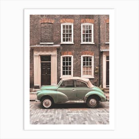 London, England I Vintage retro car on a street with urban industrial architecture and brick facade with the nostalgic aesthetic photography of a picturesque authentic British street urban city landscape Art Print