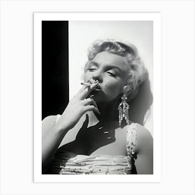 Portrait Of American Actor Marilyn Monroe In A White Beaded Gown Leaning Against A Wall Smoking A Cigarette Art Print