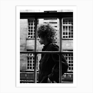 American Singer Bob Dylan Pictured Walking Past A Shop Window During His Visit To London Art Print