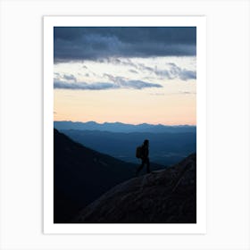 Silhouette Of A Lone Hiker Against A Vast Panorama Including Mountain Peaks Cutting Into The Horizo Art Print