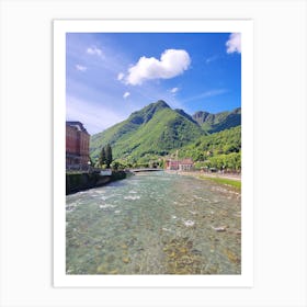 San Pellegrino terme rover from a bridge beautiful mountain in the background green mountain and a river clean water Art Print