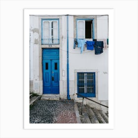 Blue laundry in Lisbon Art Print