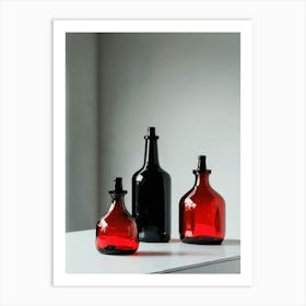 Three Red Glass Bottles Art Print