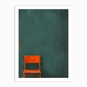 Orange Chair Against A Green Wall Art Print