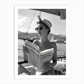 Woman Reading Newspaper On A Boat Art Print