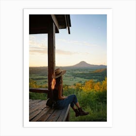 Woman Exuding A Sense Of Freedom While Sitting On A Wooden Porch Overlooking A Vast Hill And Sky Th Art Print