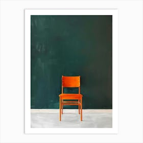 Orange Chair In Front Of A Blackboard Art Print