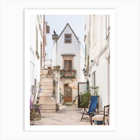 Alleyway With White Houses And Plants In Puglia, Italy Art Print