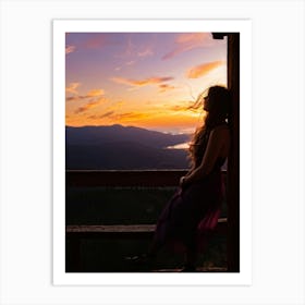 Woman Basking In Sunsets Glow On A Mountain Porch Silhouette Against A Sky Painted With Hues Of Or (2) Art Print