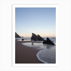 Rocks at Praia da Adraga at sunrise - pink sky on a beach in Portugal summer nature and travel photography by Christa Stroo. Art Print