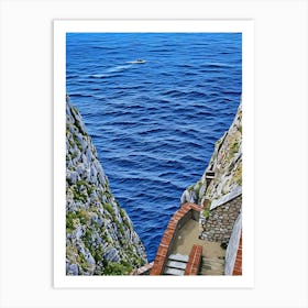 Boat on the Sea near Capo Caccia Sardinia. This image shows a view from the top of a steep, winding staircase descending between two rugged limestone cliffs toward the blue Mediterranean Sea. A small boat cruises along the calm waters in the distance, adding a sense of scale to the vastness of the sea. This scene captures the dramatic coastal landscape of Capo Caccia in Sardinia, Italy. Art Print