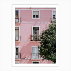 A perfect pink building with flowers on a balcony in Lisbon Art Print
