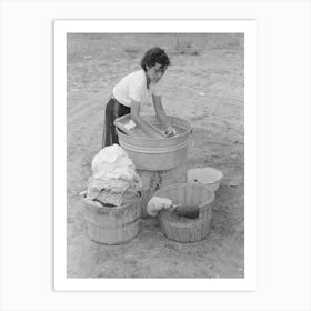 Daughter Of Spanish American Farmer Washing, Chamisal, New Mexico By Russell Lee Art Print