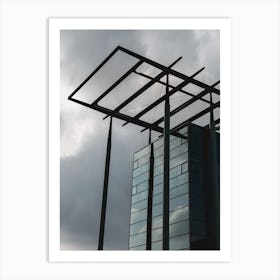 Office Building Against A Cloudy Sky Art Print