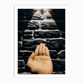 Hand Reaching Up To A Brick Wall Art Print