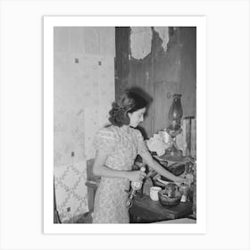 Mexican Girl Straightening Corner Of Her Kitchen, San Antonio, Texas By Russell Lee Art Print