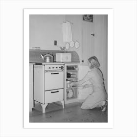 Wife Of Member Of The Arizona Part Time Farms, Chandler Unit, Maricopa County, Arizona, At Her Kitchen Stove By Russe Art Print