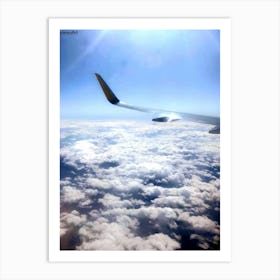 Airplane Wing Above Clouds Art Print