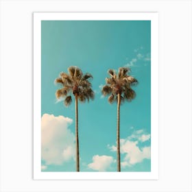 Two Palm Trees Against A Blue Sky Art Print