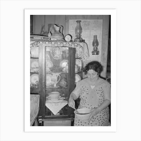 Mexican Woman Beating Cake In Front Of China Cupboard, San Antonio, Texas By Russell Lee Art Print