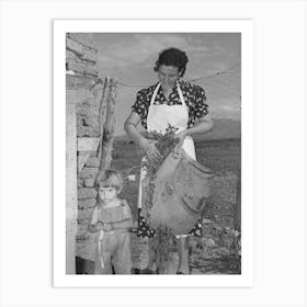 Spanish American Woman And Her Son With Greens Which They Feed To Their Rabbits Near Taos, New Mexico By Art Print