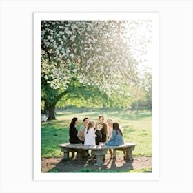 A Jovial Cluster Of Energetic Comrades Nestled Comfortably Outdoors Nestling Closely On A Weathered (1) Art Print