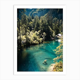 Bluelake Swiss with a statue in it Art Print