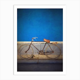 Old Bicycle Against Blue Wall Art Print