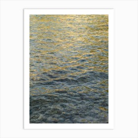 Golden light reflections in sea water Art Print