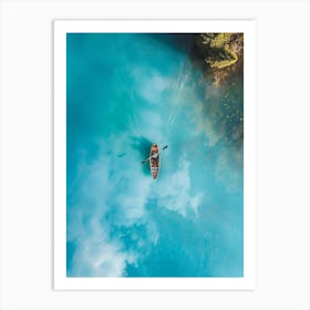 Canoe In Blue Water Art Print