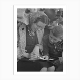 Spectators At The Rodeo Looking At The Program, San Angelo Fat Stock Show, San Angelo, Texas By Russell Lee Art Print