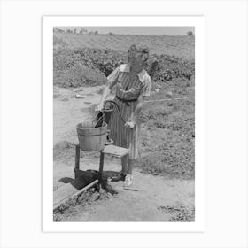 Daughter Of Sharecropper Pumping Water, New Madrid County, Missouri By Russell Lee Art Print