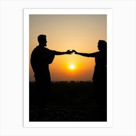 Silhouette Of A Couple At Sunset Art Print