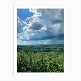 Cumulus Clouds Dominating A Spring Landscape Sunlight Peeks Through The Overcast Sky Casting A Mos (1) Art Print