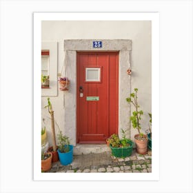 The red door nr. 25 in Alfama, Lisbon, Portugal - summer street and travel photography by Christa Stroo Photography Art Print