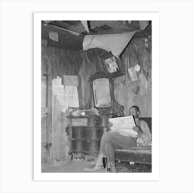 Sharecropper Reading Newspaper In Corner Of Living Room, Note The Bureau And Ceiling, Near Southeast Missouri Art Print