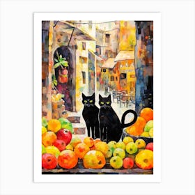 Two Black Cats With Fruit In Front Of A Town Art Print