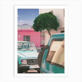 Turquoise Cars And A Pink House Art Print
