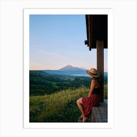 Woman Exuding A Sense Of Freedom While Sitting On A Wooden Porch Overlooking A Vast Hill And Sky Th (1) Art Print