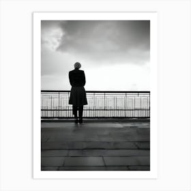 Silhouette Of A Man On A Railing-Reimagined Art Print