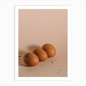 Three Brown Eggs On A Beige Background Art Print