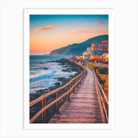 A Boardwalk That Runs Along The Side Of The Ocean Near A Coastline Art Print