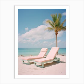 Pink Lounge Chairs On The Beach Art Print