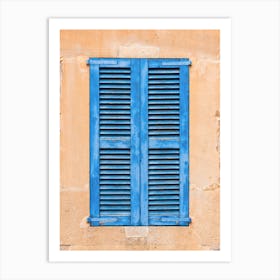 Blue Shutters On A old Wall Art Print