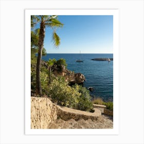 Stone steps lead into a Mediterranean bay Art Print